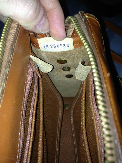 how to spot a fake dooney and bourke bag|dooney & bourke authenticate number.